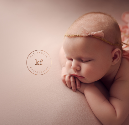 newborn_girl_photographer_studio_lapeer_michigan_pink_bow_backdrop