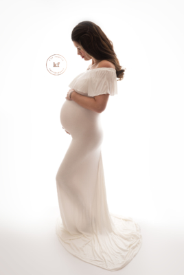 north_branch_maternity_photographer_studio_backlit_white_dress